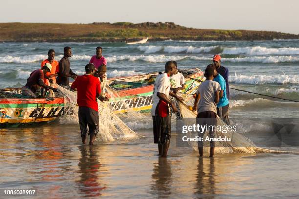 Fishing activity continues in the morning as traditional fishing remains one of the main livelihoods of the community at Yoff neighborhood in Dakar,...