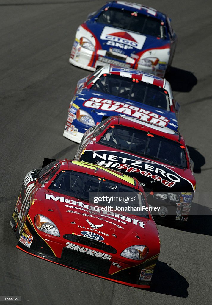 Ricky Rudd Throwback Ricky Rudd in the Motorcraft Ford leads a pack of cars during the ...