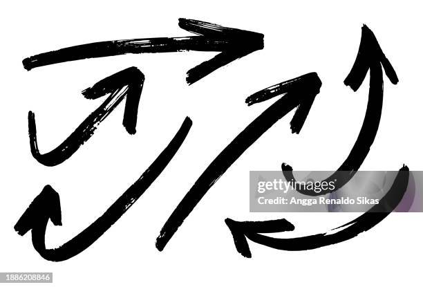 ink brush black and white arrows - arrow symbol stock illustrations