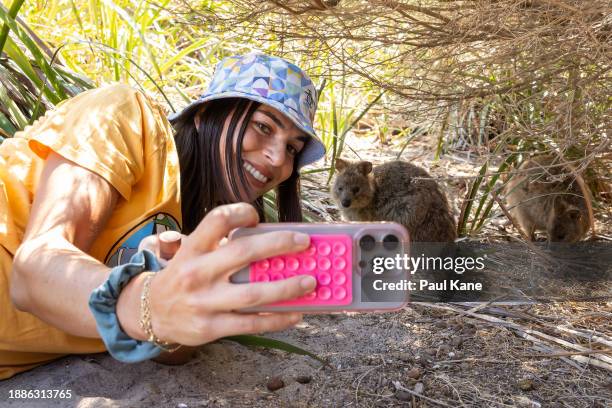 Ajla Tomljanovic of Team Australia takes a selfie with a Quokka on Rottnest Island ahead of the 2024 United Cup on December 27, 2023 in Perth,...