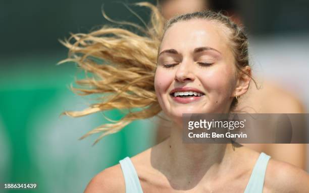 powerful marathon finish line celebration moment - exhausted at finish line stock pictures, royalty-free photos & images
