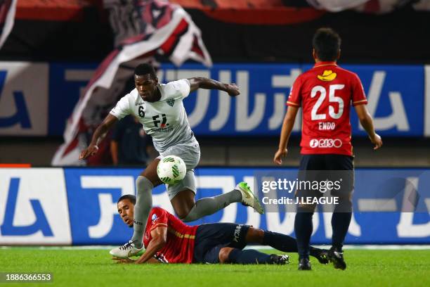 Danilson Cordoba of Avispa Fukuoka controls the ball against Wellington Daniel Bueno of Kashima Antlers during the J.League J1 first stage match...