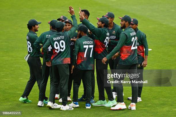 Bangladesh players celebrate a wicket during game one of the Men's T20 International series between New Zealand and Bangladesh at McLean Park on...