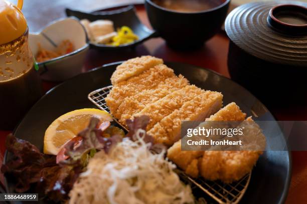 tonkatsu (deep fried pork) recipe - iron bowl stock pictures, royalty-free photos & images