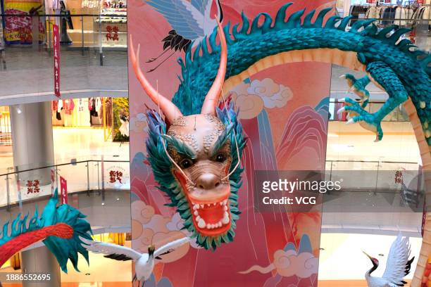 Meter-tall paper dragon statue is seen at a shopping mall on December 27, 2023 in Shenyang, Liaoning Province of China. The upcoming year is the year...