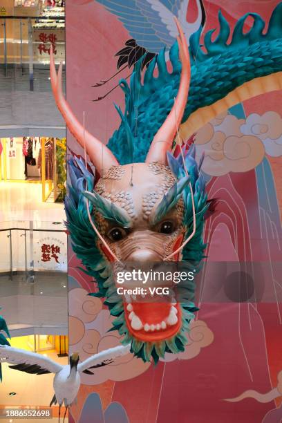 Meter-tall paper dragon statue is seen at a shopping mall on December 27, 2023 in Shenyang, Liaoning Province of China. The upcoming year is the year...