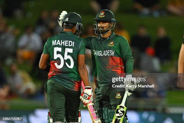 Shak Mahedi Hasan and Litton Kumer Das of Bangladesh during game one of the Men's T20 International series between New Zealand and Bangladesh at...