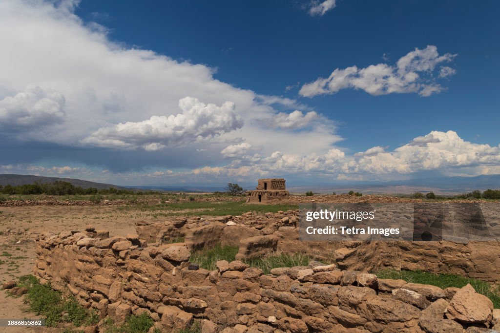 USA, New Mexico, Espanola, Puye Cliffs, Clouds over Puye Cliff Dwellings