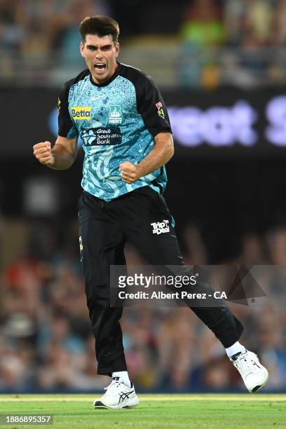 Xavier Bartlett of the Heat celebrates dismissing Cameron Bancroft of the Thunder during the BBL match between Brisbane Heat and Sydney Thunder at...
