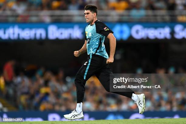 Xavier Bartlett of the Heat celebrates dismissing Cameron Bancroft of the Thunder during the BBL match between Brisbane Heat and Sydney Thunder at...