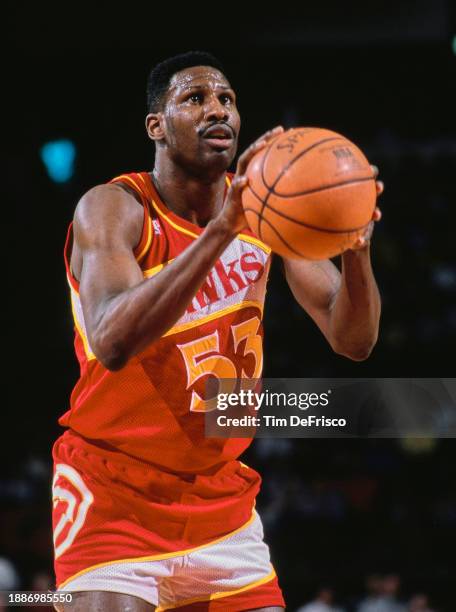 Cliff Levingston, Power Forward for the Atlanta Hawks prepares to make a free throw shot during the NBA Midwest Division basketball game against the...