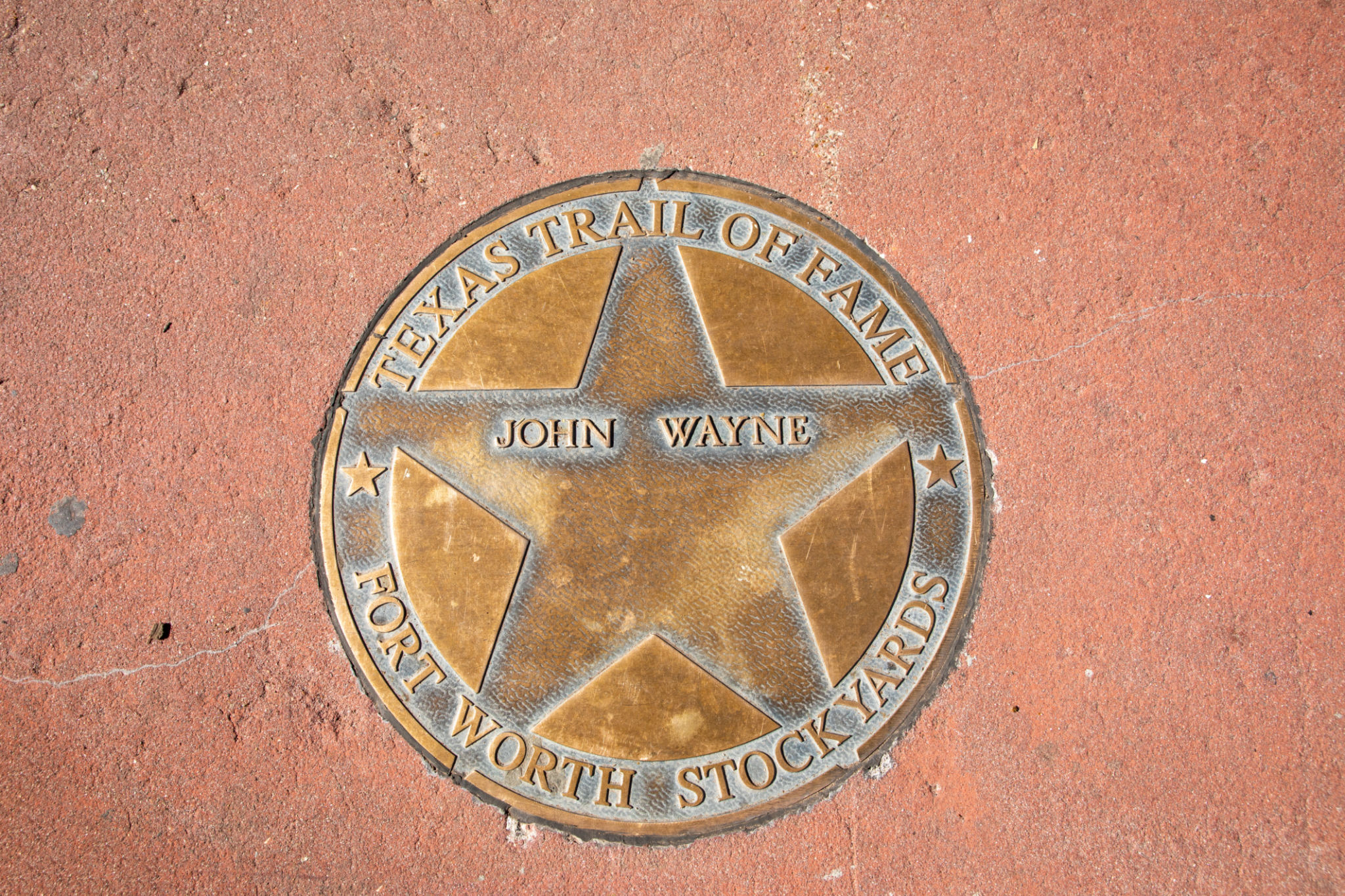 texas trail of fame honors John Wayne with a plate at walk of fame in Fort Worth texas trail of fame honors John Wayne with a plate at walk of fame in Fort Worth