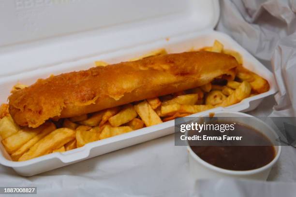 fish and chips - gravy stock pictures, royalty-free photos & images