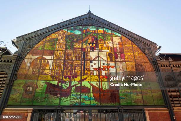 Stained glass window on the exterior of the Atarazanas Market in Malaga, Spain, is featuring 108 panels of painted glass that depict monuments such...