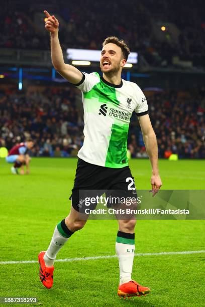 Diogo Jota of Liverpool celebrates scoring his side's second goal during the Premier League match between Burnley FC and Liverpool FC at Turf Moor on...