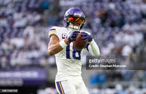 Justin Jefferson of the Minnesota Vikings warms up before the game against the Detroit Lions at U.S. Bank Stadium on December 24, 2023 in...