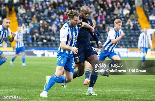 Kilmarnock's Marley Watkins and Dundee's Mo Sylla in action during a cinch Premiership match between Kilmarnock and Dundee at Rugby Park, on December...