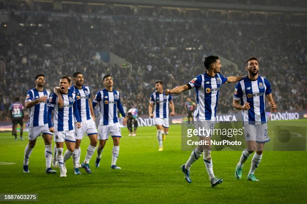 The FC Porto team is celebrating after scoring a goal during the Portuguese First League soccer match between FC Porto and Desportivo de Chaves at...
