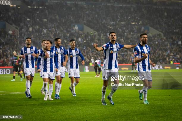 The FC Porto team is celebrating after scoring a goal during the Portuguese First League soccer match between FC Porto and Desportivo de Chaves at...