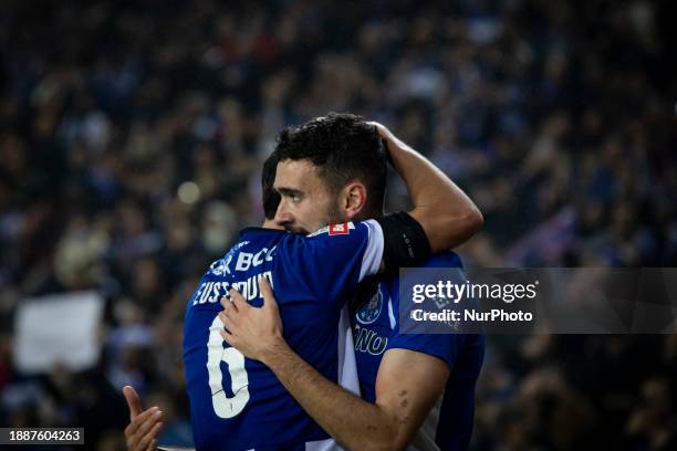 Stephen Eustaquio and Joao Mario of FC Porto are celebrating after scoring a goal during the Portuguese First League soccer match between FC Porto...