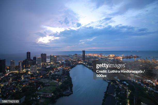 aerial view of illuminated city at night,colombo,western province,sri lanka - western province sri lanka stock pictures, royalty-free photos & images