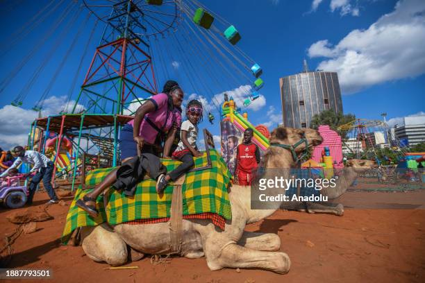 Children have fun with their families with various activities one day before New Year's Eve at Uhuru Park of Nairobi, Kenya on December 30, 2023.