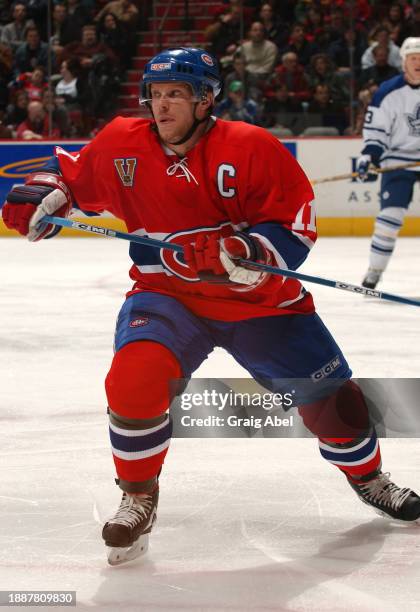 Saku Koivu of the Montreal Canadiens skates against the Toronto Maple Leafs during NHL game action on January 24, 2004 at Bell Centre in Montreal,...