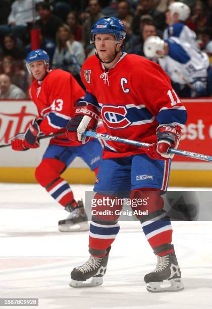 Saku Koivu of the Montreal Canadiens skates against the Toronto Maple Leafs during NHL game action on January 24, 2004 at Bell Centre in Montreal,...