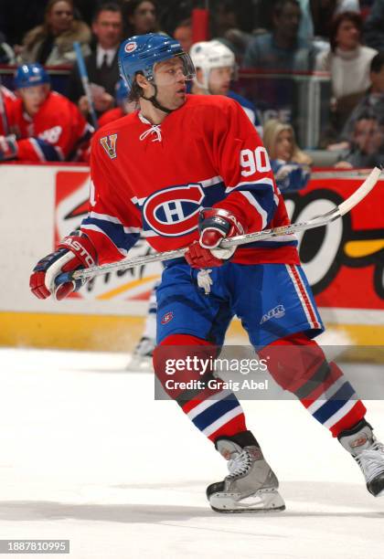 Joe Juneau of the Montreal Canadiens skates against the Toronto Maple Leafs during NHL game action on January 24, 2004 at Bell Centre in Montreal,...