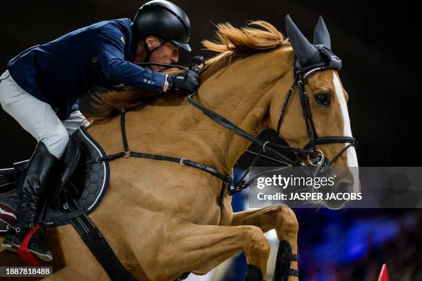 Rider Hans-Dieter Dreher with Vestmalle Des Cotis pictured in action during the FEI World Cup Jumping competition at the 'Vlaanderens Kerstjumping -...