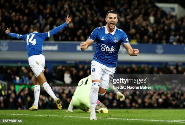 Jack Harrison of Everton celebrates after scoring their sides first goal during the Premier League match between Everton FC and Manchester City at...