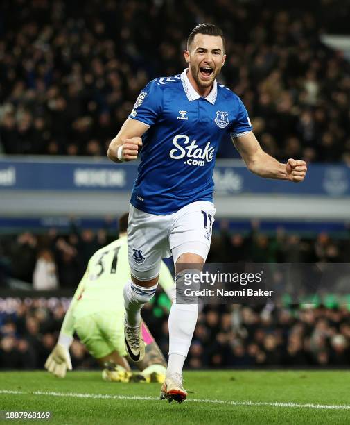 Jack Harrison of Everton celebrates after scoring their sides first goal during the Premier League match between Everton FC and Manchester City at...
