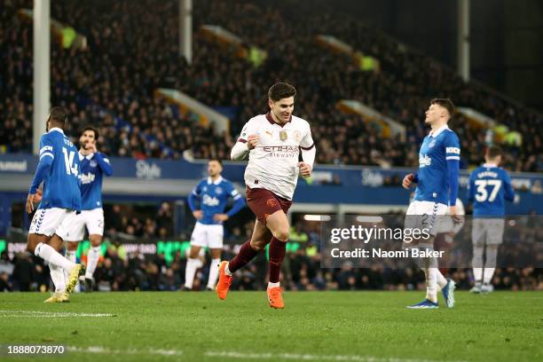 Julian Alvarez of Manchester City celebrates after scoring their team's second goal from the penalty-spot during the Premier League match between...