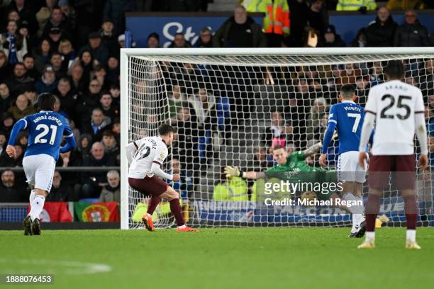Julian Alvarez of Manchester City scores their team's second goal from the penalty-spot during the Premier League match between Everton FC and...