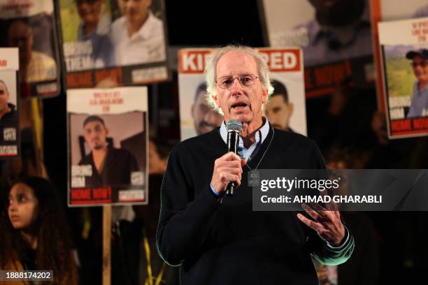 Former US Middle East coordinator Dennis Ross speaks during a rally calling for the release of Israeli hostages held in Gaza since the October 7...