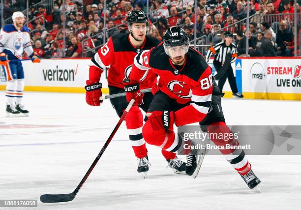 Kevin Bahl of the New Jersey Devils skates against the Edmonton Oilers at Prudential Center on December 21, 2023 in Newark, New Jersey.