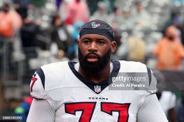 Tackle George Fant of the Houston Texans follows the action in the game in the rain between the Houston Texans vs the New York Jets at MetLife...