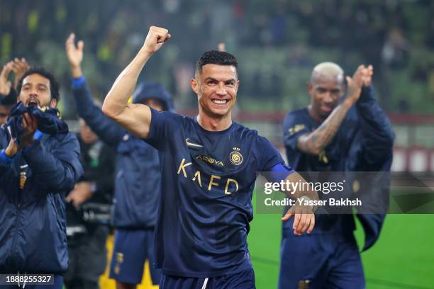 Cristiano Ronaldo of Al Nassr celebrates after winning the Saudi Pro League match between Al-Taawoun and Al-Nassr at King Abdullah Sport City Stadium...