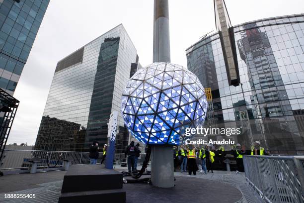 View of the world-famous Times Square crystal ball is illuminated and raised for testing the day before New Year's Eve celebrations in New York City,...