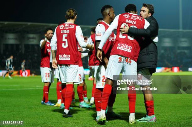 Simon Banza of SC Braga celebrates with teammate Andre Horta of SC Braga after scoring a goal during the Liga Portugal Betclic match between Casa Pia...