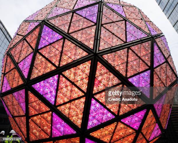 View of the world-famous Times Square crystal ball is illuminated and raised for testing the day before New Year's Eve celebrations in New York City,...