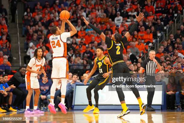 Syracuse Orange Guard Quadir Copeland shoots a three point jump shot against Pittsburgh Panthers Forward Blake Hinson during the first half of the...