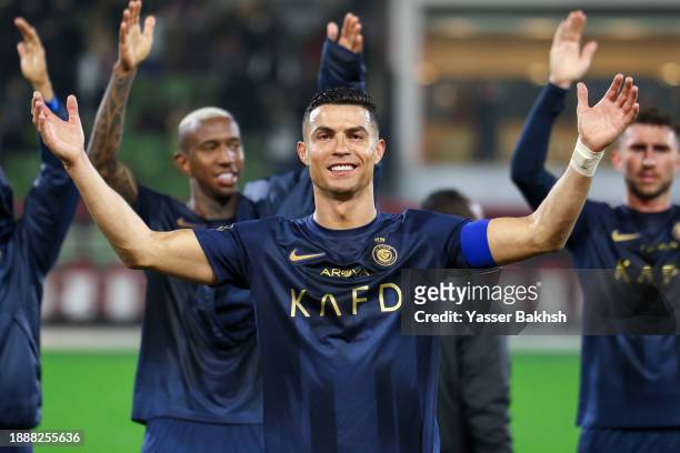 Cristiano Ronaldo of Al Nassr celebrates after winning the Saudi Pro League match between Al-Taawoun and Al-Nassr at King Abdullah Sport City Stadium...