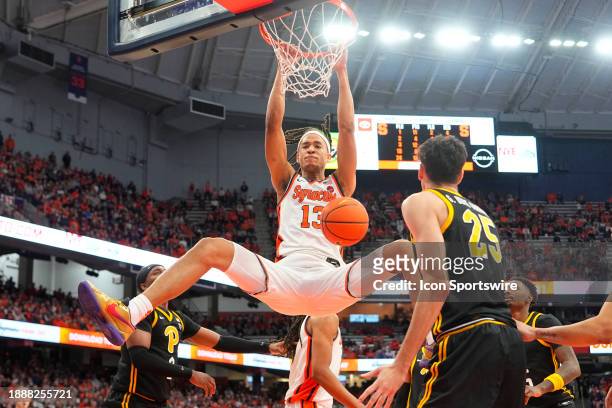 Syracuse Orange Forward Benny Williams dunks the ball during the second half of the College Basketball game between the Pittsburgh Panthers and the...