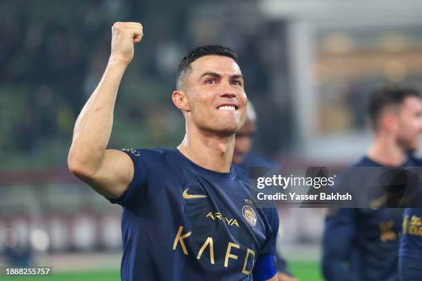 Cristiano Ronaldo of Al Nassr celebrates after winning the Saudi Pro League match between Al-Taawoun and Al-Nassr at King Abdullah Sport City Stadium...