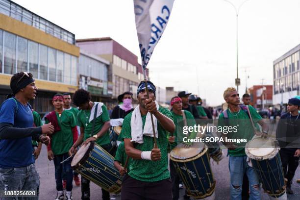 People are seen playing tambours during the San Benito celebrations in the town center. The San Benito festival is celebrated in Cabimas within the...