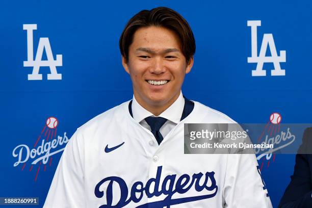 Yoshinobu Yamamoto speaks to the media during an introductory press conference at Dodger Stadium on December 27, 2023 in Los Angeles, California.