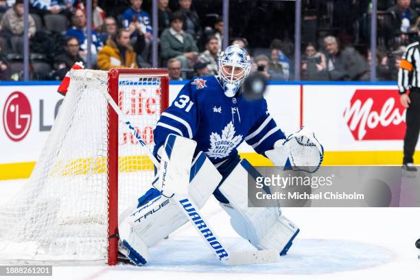 Martin Jones of the Toronto Maple Leafs watches the puck against the Carolina Hurricanes at Scotiabank Arena on December 30, 2023 in Toronto,...