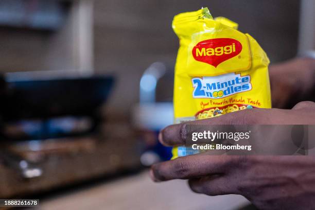 Street food vendor prepares Maggi instant noodle at a stall in Noida, India on Tuesday, Oct. 17, 2023. Indian government has pushed to attract...