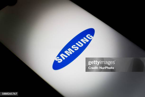 The Samsung logo is displayed on a smartphone screen in Athens, Greece, on December 30, 2023.